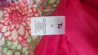 Vibrant pink quilted shower proof jacket with floral embroidery